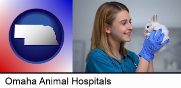 young female vet caring for a bunny in Omaha, NE